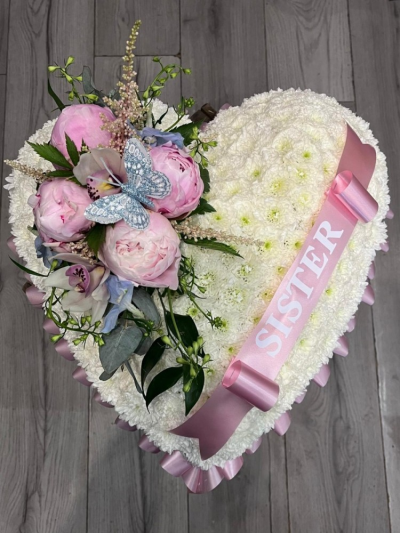 Loving Heart Tribute - A beautifully handcrafted heart-shaped funeral tribute featuring a fresh white chrysanthemum base.