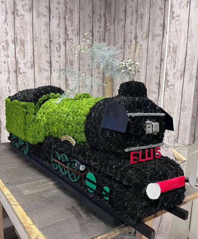 Train Memorial Tribute - A detailed train funeral tribute that can be personalised with a name and chosen colours, handcrafted by Daisy Chain Florist in Scunthorpe.