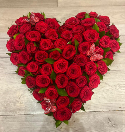 Red Rose Heart - Red Roses need no words as they signify Love and devotion.  This heart is overflowing with love and devotion. This beautiful Red rose heart symbolizes an unbreakable bond with a lo