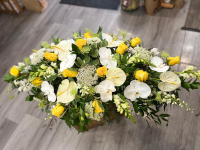 Elegant White & Yellow Spray - An elegant funeral spray featuring soft whites, sunny yellows and lush greenery, creating a graceful tribute. Handcrafted by Daisy Chain Florist in Scunthorpe.